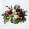 The Snowberry Pine Arrangement blends classic holiday charm with soft winter texture.