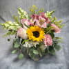 Introducing Our Design Sunny Posy beautifully arranged with sunflower, pink roses, purple