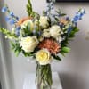 Tall Bouquet of blue delphinium, white roses, accent florals and greens if