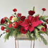 Fresh flowers in red and green color palette arranged in a 12inch