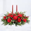 The Cedarlight Candle Centerpiece brings classic holiday warmth to the table with