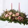 The Blush Solstice Centerpiece blends romantic winter tones with soft seasonal elegance.
