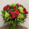 A beautiful holiday arrangement with  2 dozen red Roses, Green Hydrangeas