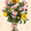 Bring joy and charm to your special recipient with its vibrant sunflowers