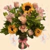 Add a touch of light pink to her day with this sunflowers