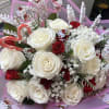 1 dozen roses with baby roses, candy canes, Christmas greenery *** pins