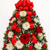Our flower tree arrangement is popular for its festive style and compact