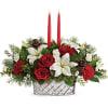 Capture the magic of Christmas with this lush winter rose centerpiece, arranged