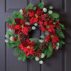 Beautiful Balsam Wreath Decorated for Christmas with Gold and red balls. Call