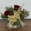 Who doesn&rsquo;t love a little sparkle? This arrangement with mixed pine and