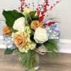 Elegant hydrangea, white and toffee roses, winterberry, hints of pine! 