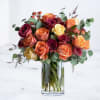 The Mixed Roses arrangement features a rich blend of premium roses in
