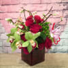 ASSORTMENT OF DEEP RED ROSES, RED CALLA LILIES, GREEN HYPERICUM, GREEN CYMBIDIUM