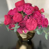 Red Piano Roses steal the show in this arrangement. We added some