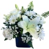 The Sapphire Serenity bouquet offers a peaceful tribute, its pure white blooms