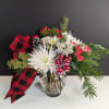 Celebrate the season in style with our Holly Jolly Blooms arrangement. This