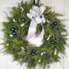 Embrace Winter Elegance with the Crystal Frost Wreath

Bring the serene beauty of