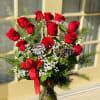 Send a sweet winter message with short stem red roses, decorative winter