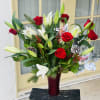 Arrangement Measures Approximately 24&quot;H
Just in time for the season of celebration, this