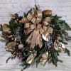 Our Golden Christmas Wreath is made of fresh Frasier pine. Decorations for