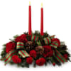 Drawing from the rich traditions of holiday d&eacute;cor, this festive centerpiece is