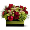 A mix of elegant blossoms such as roses, orchids and hydrangea in