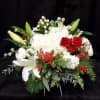 Compact style cube, Christmas vase arrangement.
Hydrangeas, Lilies, Berries, Stock, Spray Roses, Roses