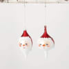 Jolly is the word for these Santa face painted finials. Charming details