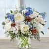 This  arrangement with white roses, carnations, and Peruvian lilies (alstroemeria); blue
