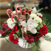 White Orchid&#039;s, White Poms, Red Alstroemeria, and candy canes.