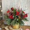 The Winter Delight arrangement offers the option of white flowers, red flowers
