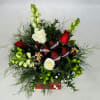 All Wrapped Up for Christmas bouquet is the perfect gift to send