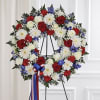 Our Round Wreath Arrangement comes in two sizes 22" and 24". The