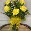6 Bikini yellow roses arranged in a vase with filler flowers. Yellow