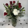This beautiful spring arrangement is a 1/2 dozen premium red roses with