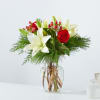 The &quot;Evergreen Delight&quot; flower arrangement beautifully marries the freshness of evergreens with