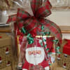 Santa&#039;s Goodies Basket is filled with Godiva Chocolates, Holiday Hard Candy, Too