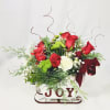 Christmas Wooden White Sleigh with JOY in red lettering. If you love