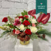 Festive and elegant Christmas 2024 floral arrangement. 