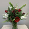 This beautiful arrangement is perfect for someone this holiday.  Red white