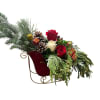 Send holiday joy their way! Our dashing arrangement features classic Christmas-colored blooms