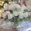 This refined holiday centerpiece brings quiet beauty and winter sophistication to any