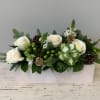 Beautiful floral arrangement for the holiday.  Simple yet classy, whites and