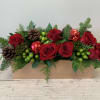Beautiful arrangement in a Pine box. Lots of reds and greens to