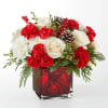 An aromatic experiece, the Christmas Market Bouquet includes assorted seasonal greens to
