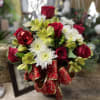 Make someone merry with a beautiful bouquet of roses, carnations and alstromariea