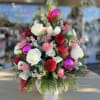 Stunning g Christmas Tree Bouquet with roses and holiday ornaments 