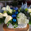 Gorgeous all white centerpiece that includes Calla Lillie&rsquo;s, Hydrangeas, Lisianthus in modern