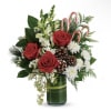 Send holiday greetings with this bouquet of red roses, white snapdragons, and