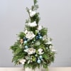 This beautiful new year tree includes cymbidium orchids, succulents, holiday accessories, and